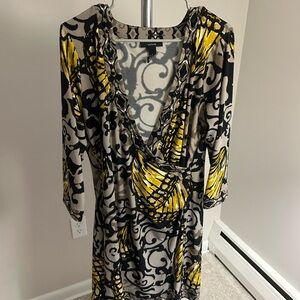 Yellow and black dress with wrap around design size L Alfani